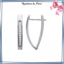 Créoles triangle argent et zirconiums.
